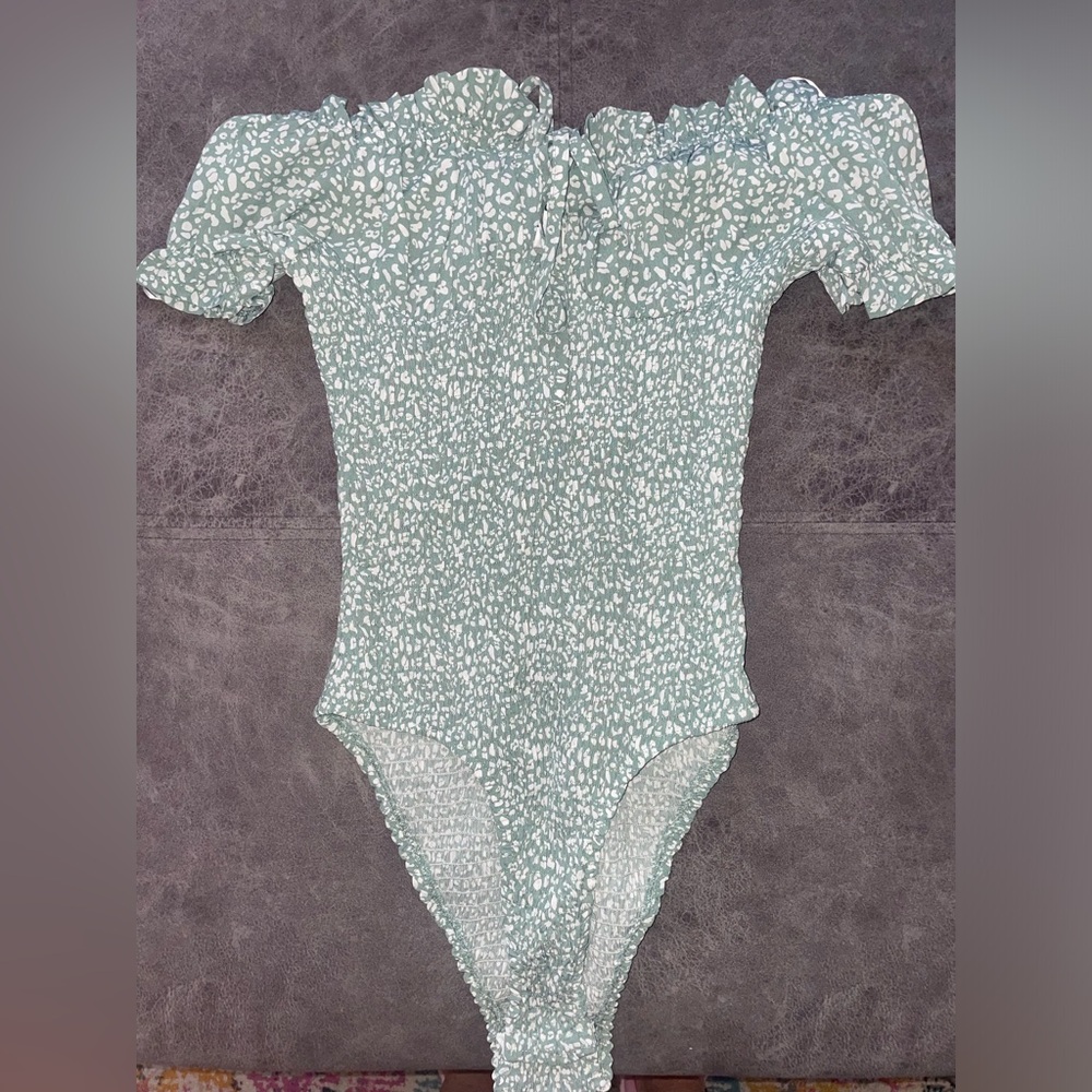 Green and white HELLO MOLLY  off the shoulder bodysuit.